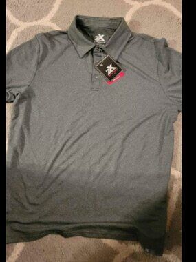 Men's size medium polo shirt. NEW WITH TAGS